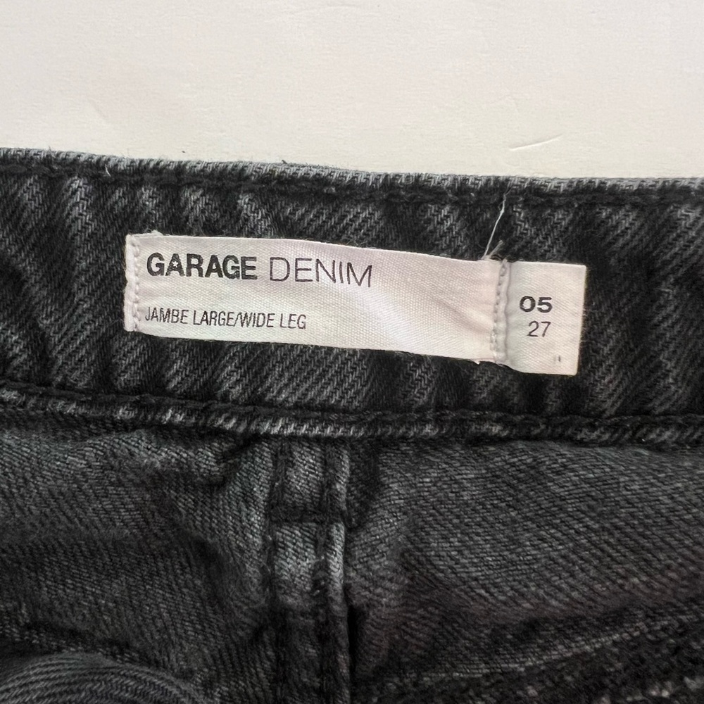 Black ripped garage jeans